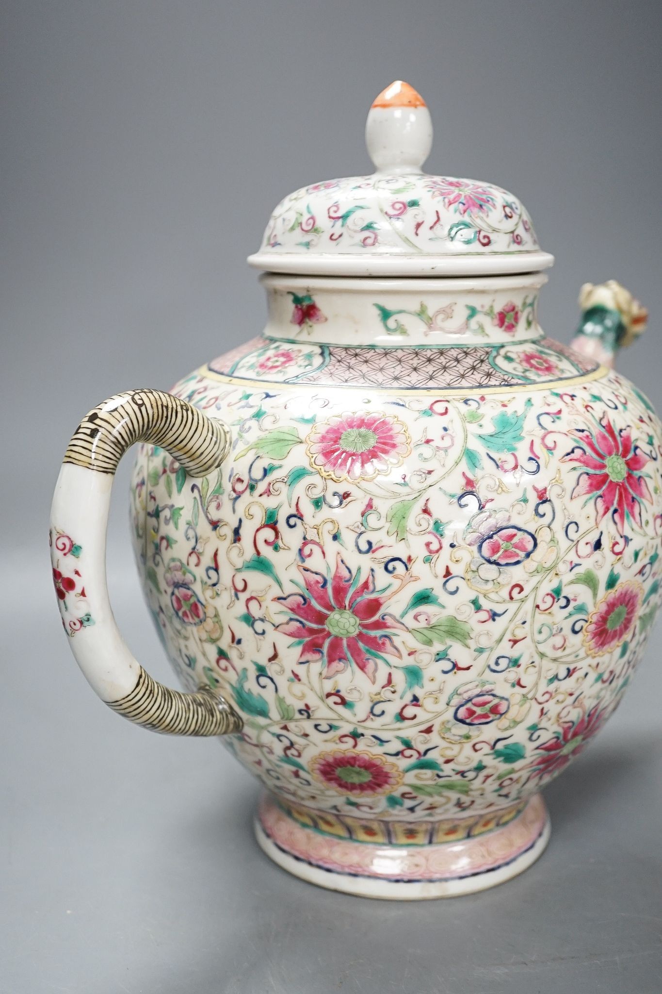 A large 19th century Chinese famille rose wine pot, and another wine pot, tallest 27cm